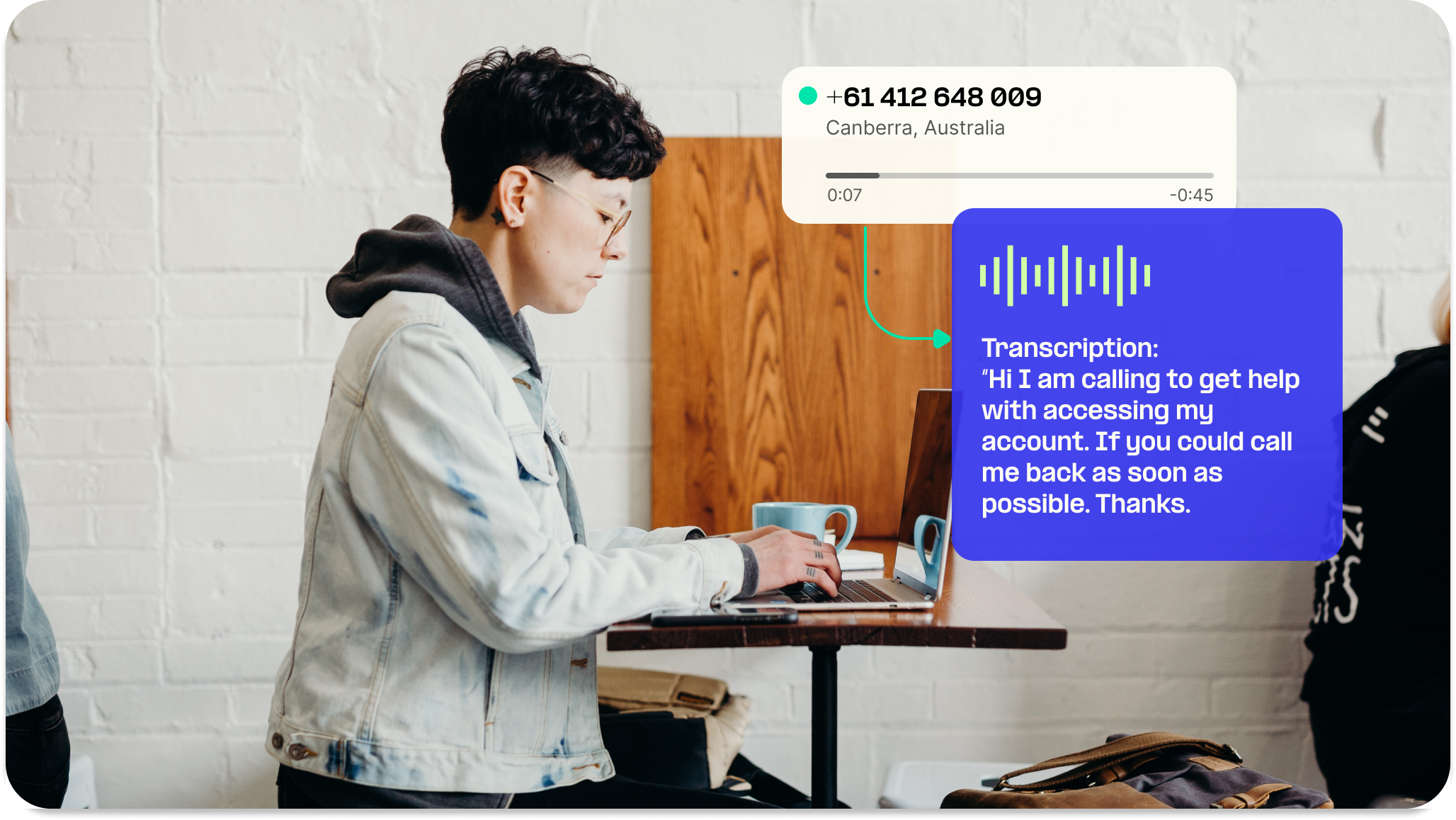 A man with his laptop transcribing a voicenote.